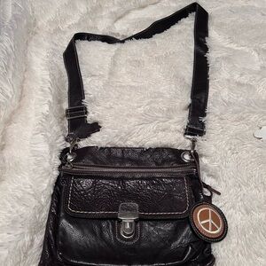 Roots Brown Leather Crossbody Bag with Brown Peace Charm